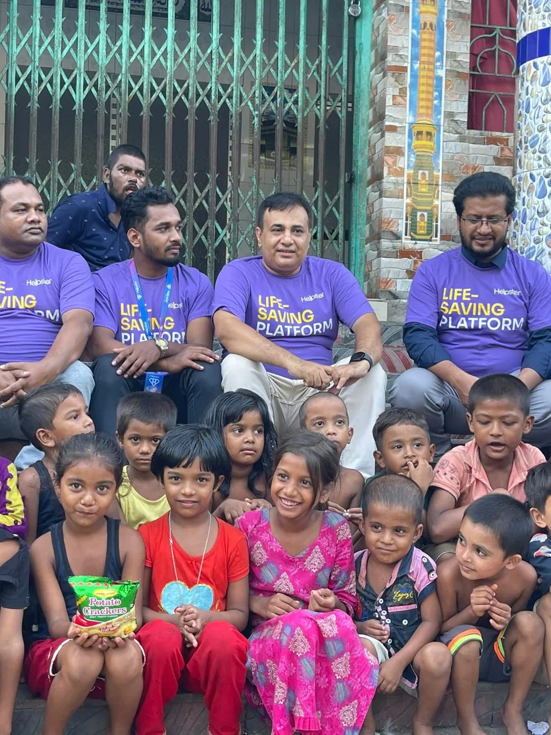 Volunteers helping children in a hospital